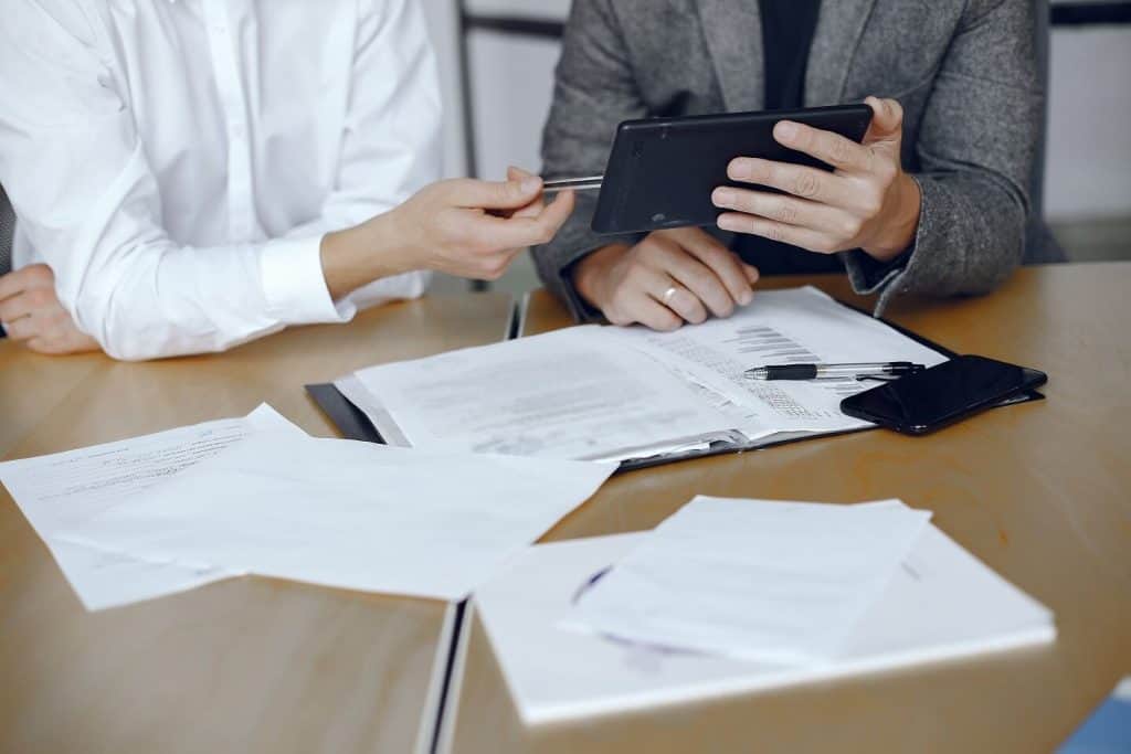 couple filing divorce documents to a court